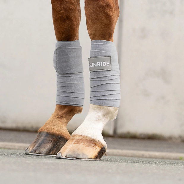 set of two grey fleece bandages with velcro closure from wellington line by sunride