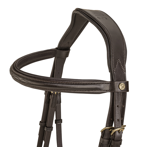 detailed view of neck part of hannoverian bridle hannover in brown leather with golden mounting and reins included by sunride