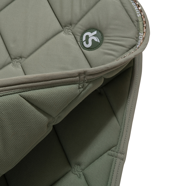 soft inside of breathable dressage saddle pad wellington olive with  gemstones and fur on withers