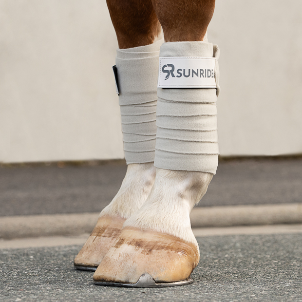 set of two beige fleece bandages with velcro closure from wellington line by sunride on the horse