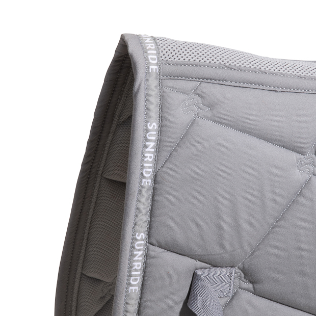 detailed view of spine air mesh circulation of grey wellington line jumping saddle pad with breathable air mesh spine by sunride