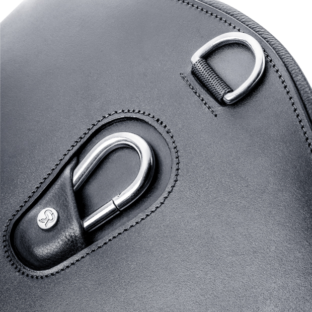 detailed view of hook and ring on elastic black leather stud guard girth hickstead with silver mounting by sunride