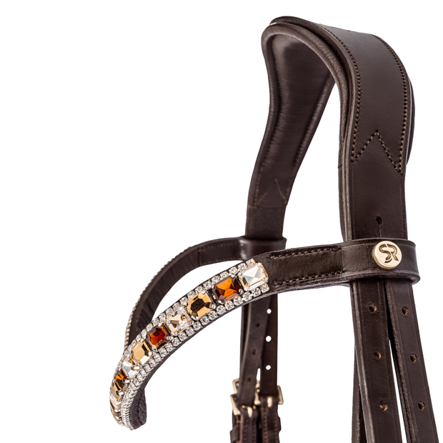 detailed view of gem stones and neck part of swedish leather bridle aspen with glossy nose band and matching gem stones in brown with golden mounting including reins