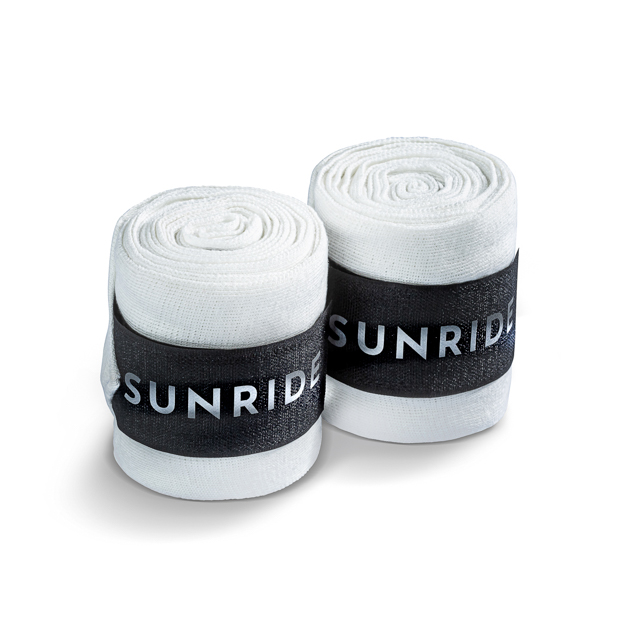 set of elastic fleece bandages white with reflecting sunride logo