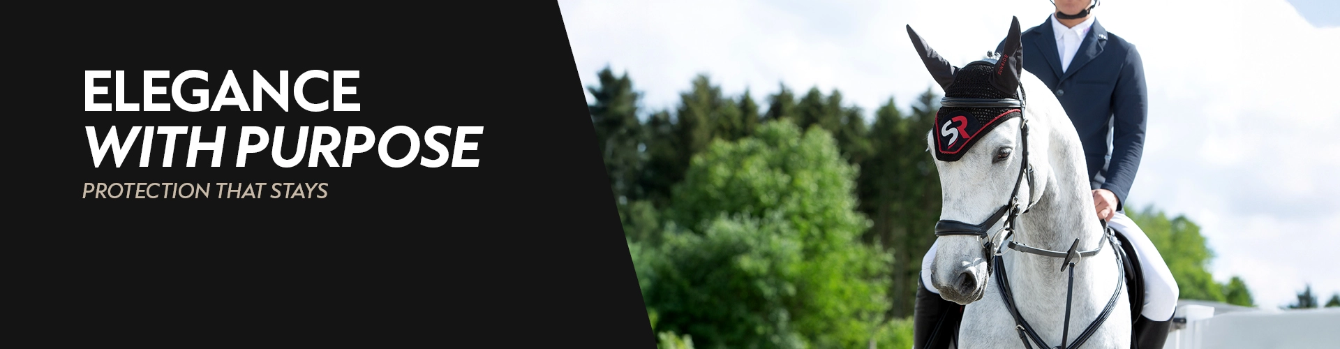 Fly hood A horse with a red fly hood and rider in the background there are green trees