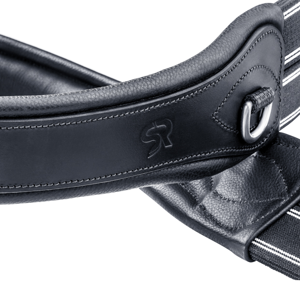 detailed view of d-ring of elastic black leather saddle girth soho with silver mounting by sunride