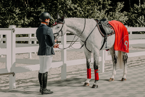 exclusive line set of red cooler rug with matching saddlepad, earnet and bandages by sunride