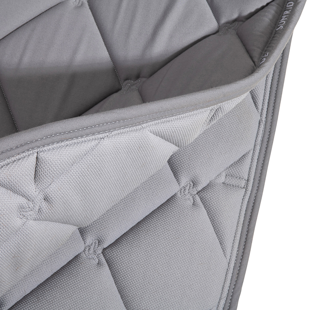 detailed view of breathable inside of grey wellington line jumping saddle pad with breathable air mesh spine by sunride