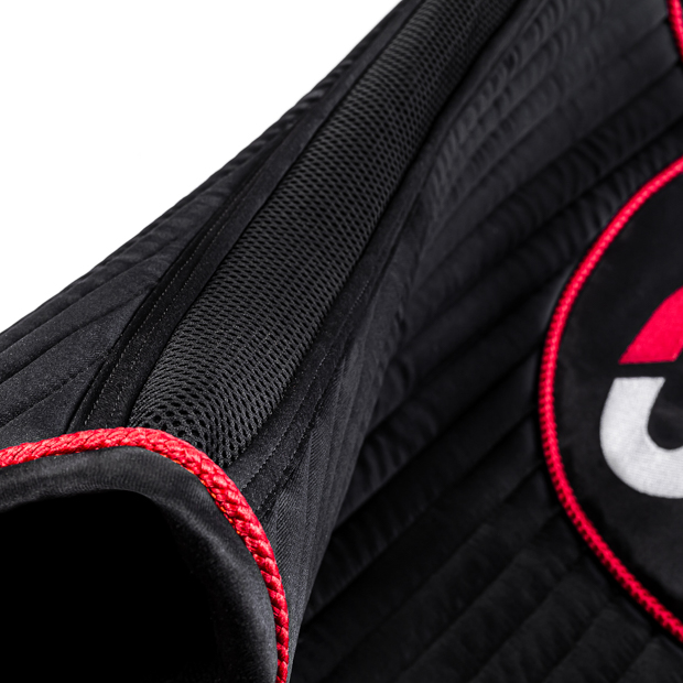 detailed view of air mesh circulation on black red sr line jumping saddle pad with breathable air mesh spine by sunride