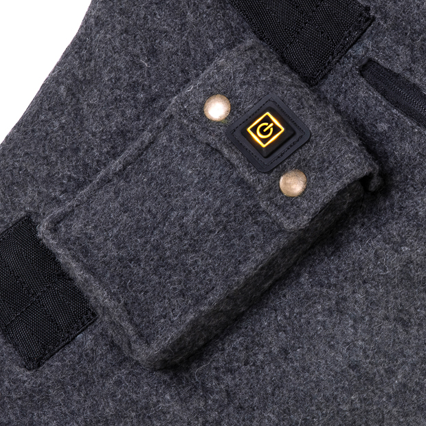 detailled view yellow light for moderate battery power on heating rug st. moritz from grey wool by sunride