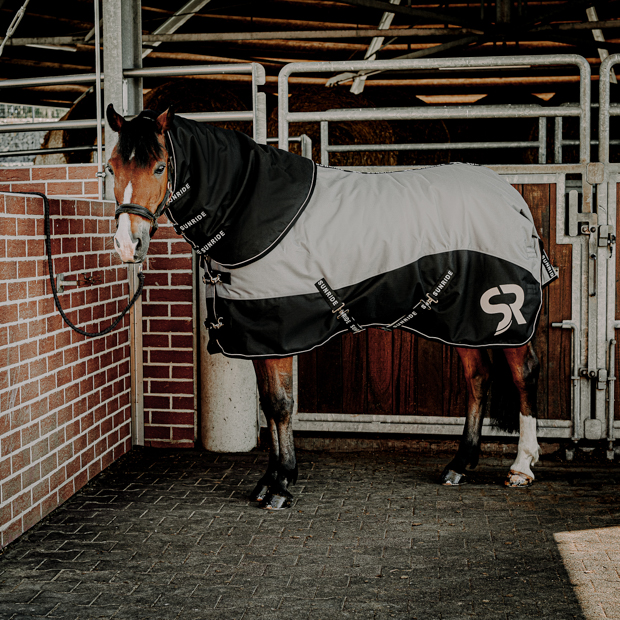 black neck part attached to grey helsinki winter rug on a horse